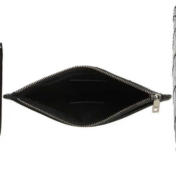 niki quilted leather zip pouch at $495